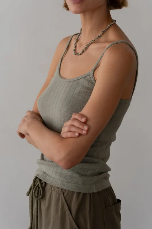 The Pointelle Cami Tank sold by DONNI.