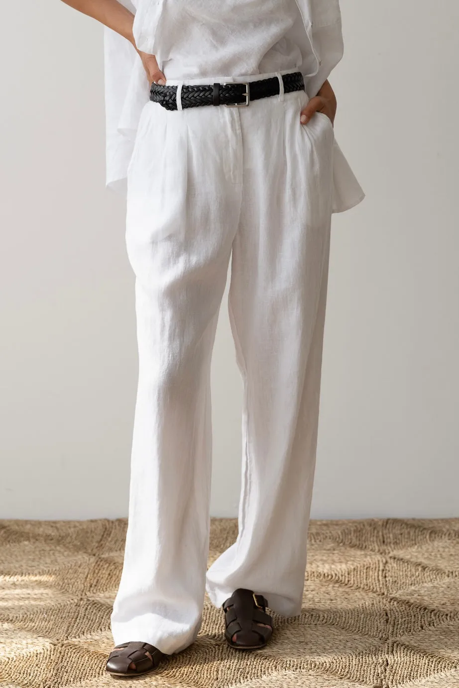 The Linen Pleated Trouser sold by DONNI.