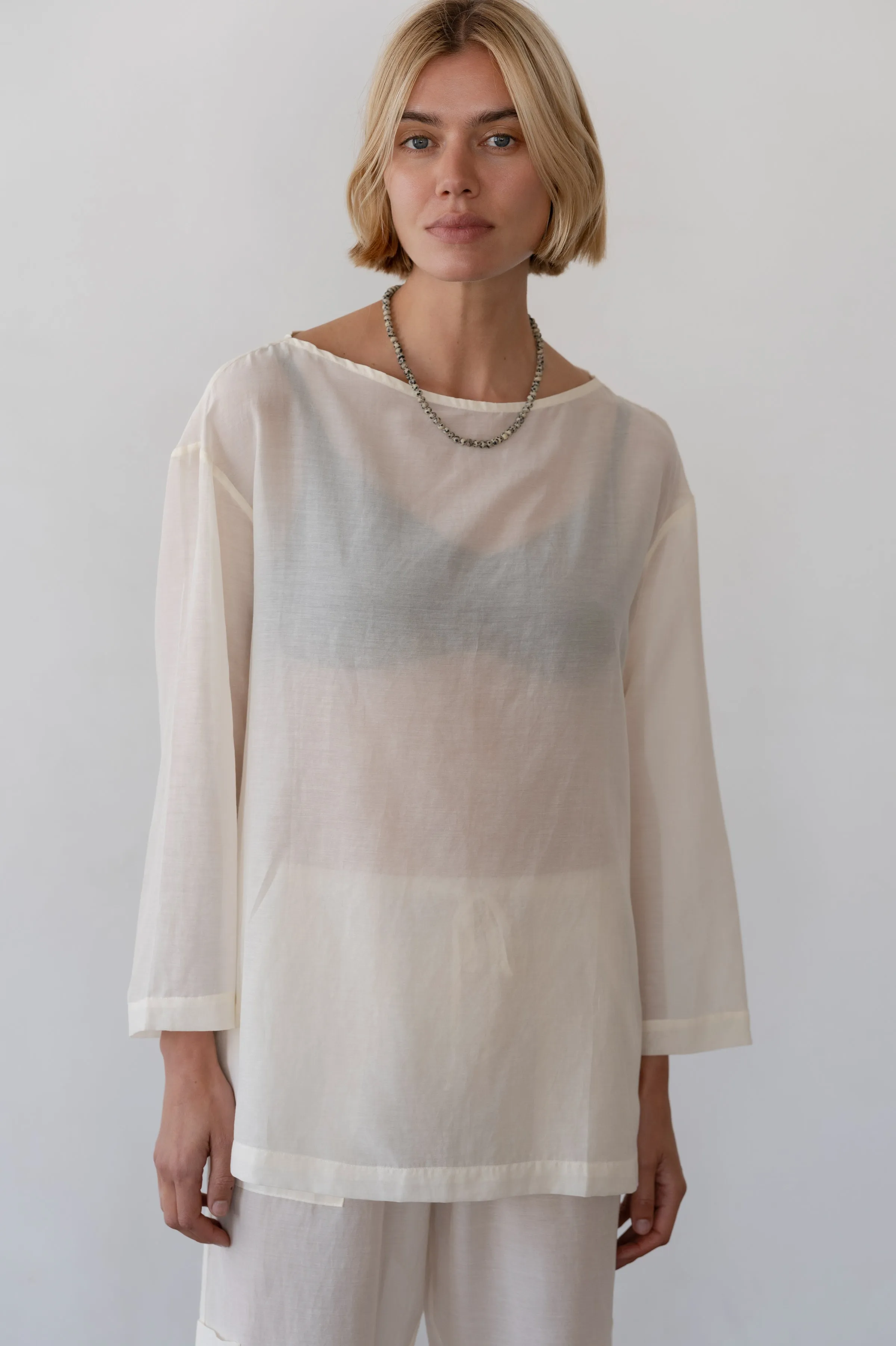 The Silk Cotton Sheer Boatneck sold by DONNI.