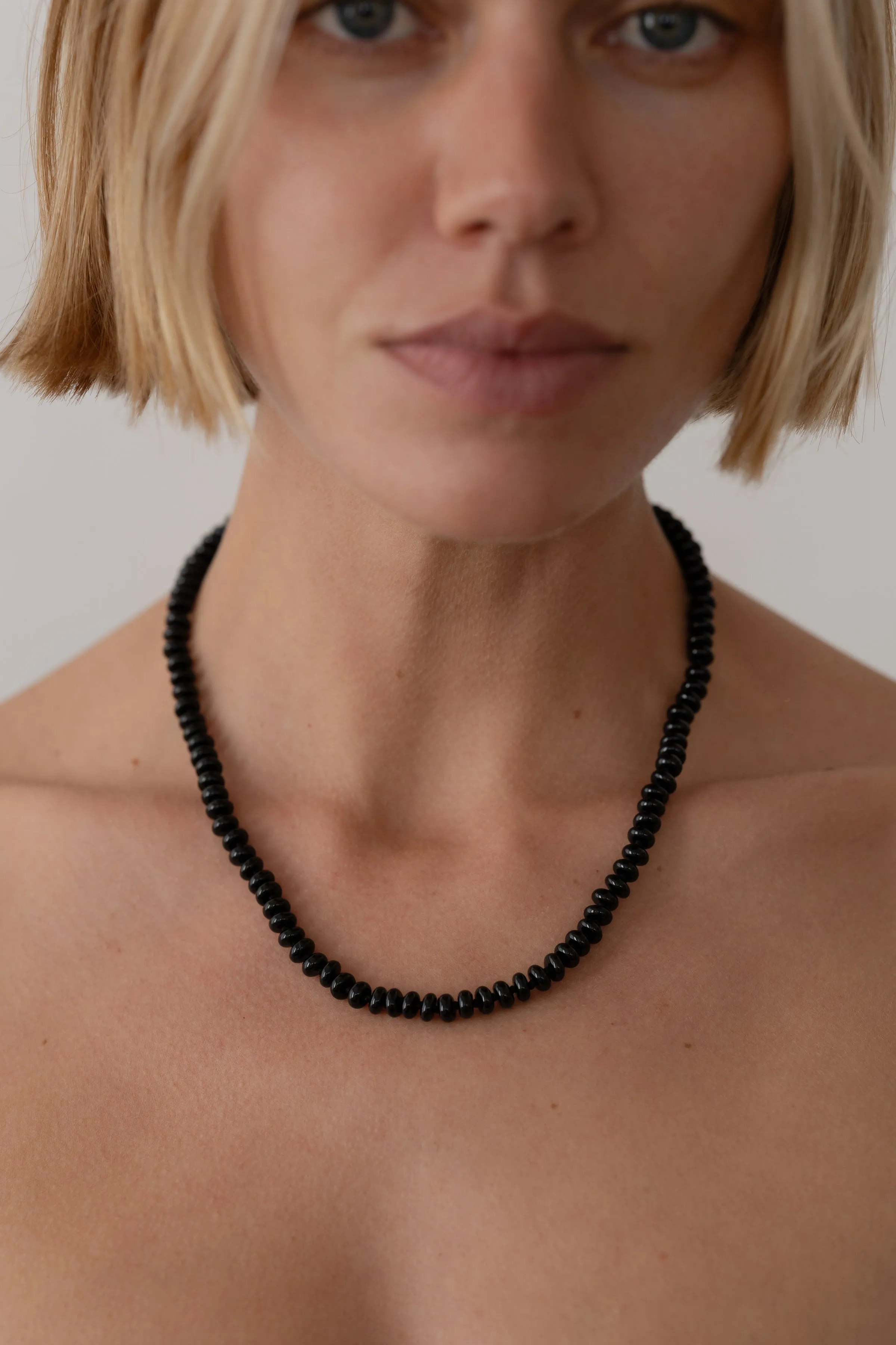The Onyx Rondelle Necklace sold by DONNI.