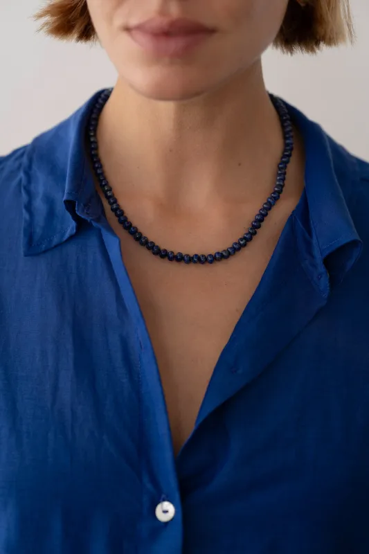 The Lapis Rondelle Necklace sold by DONNI.