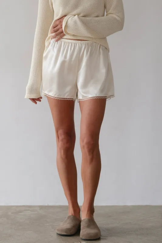 The Silk Lace Tap Short sold by DONNI.