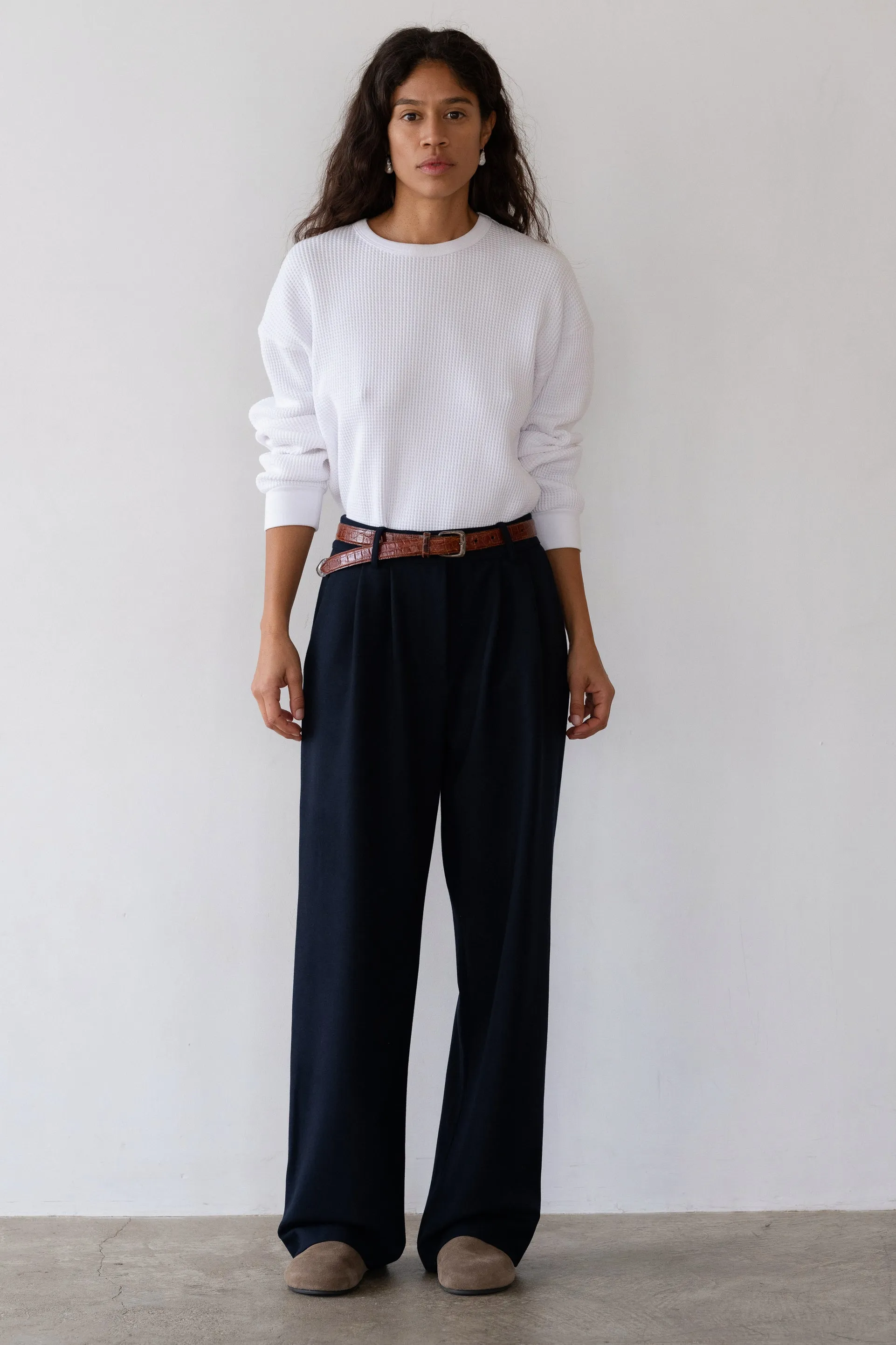The Flannel Pleated Trouser sold by DONNI.