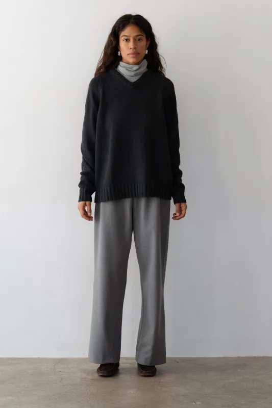 The Heavy Cotton Knit V-Neck Sweater sold by DONNI.