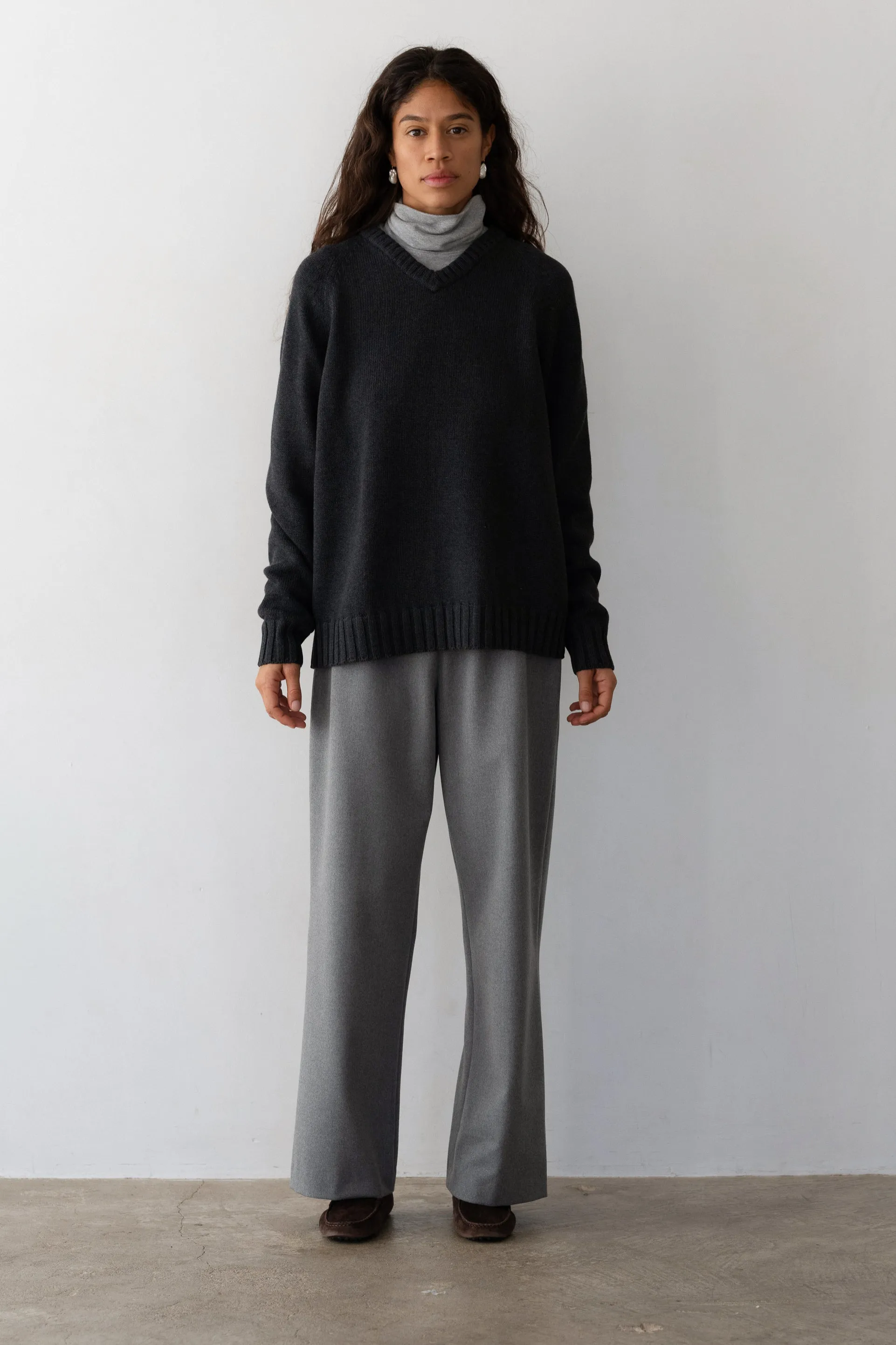 The Heavy Cotton Knit V-Neck Sweater sold by DONNI.