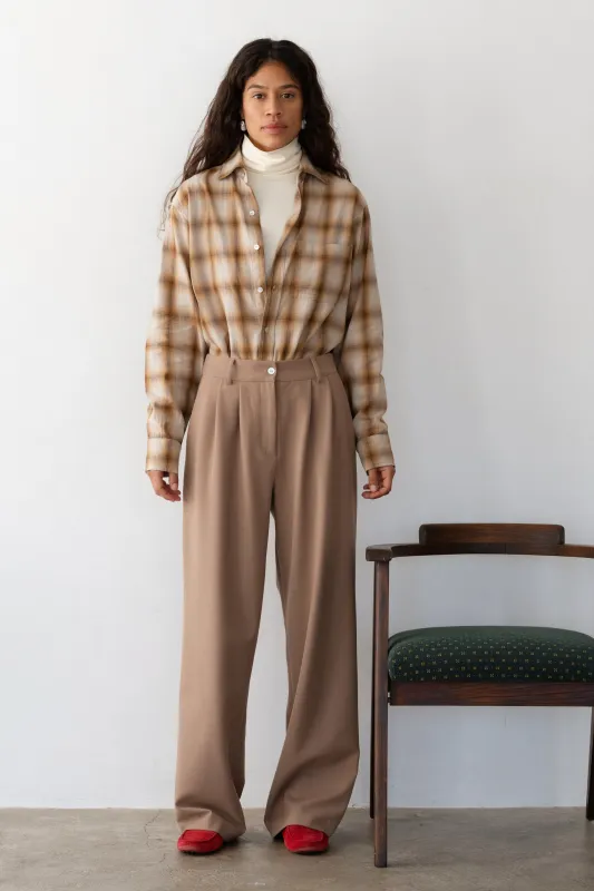 The Flannel Pleated Trouser sold by DONNI.