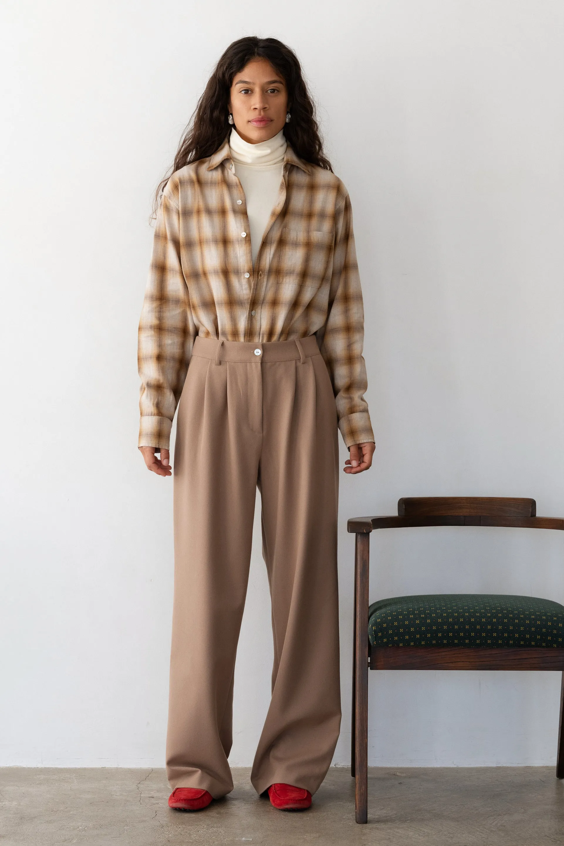 The Flannel Pleated Trouser sold by DONNI.