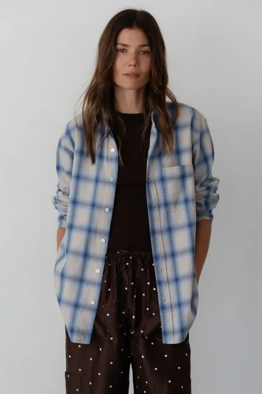 The Plaid Flannel Shirt sold by DONNI.