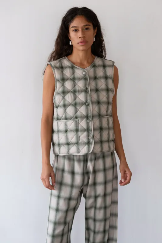 The Quilted Plaid Flannel Vest sold by DONNI.