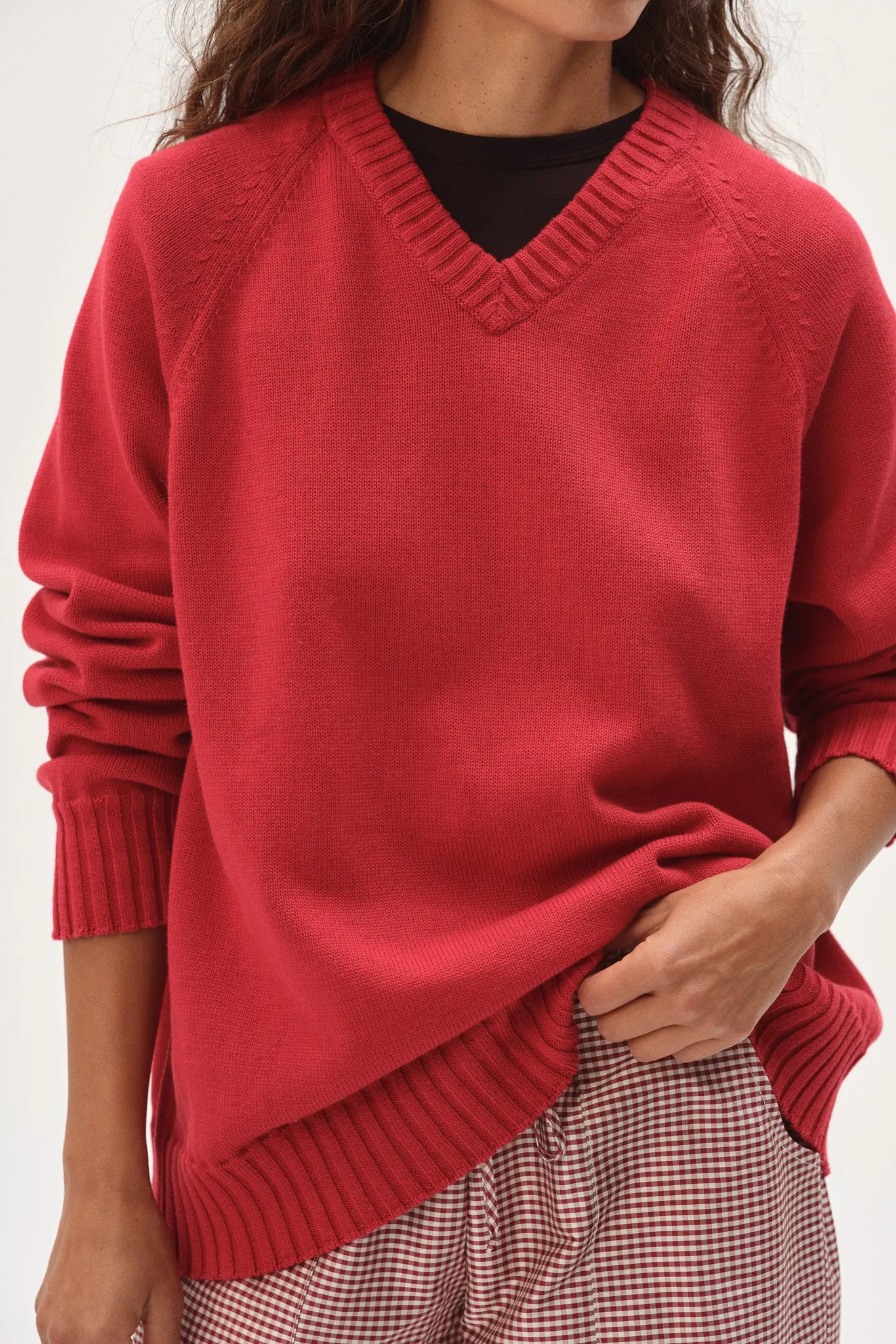 The Cotton Knit V-Neck Sweater sold by DONNI.
