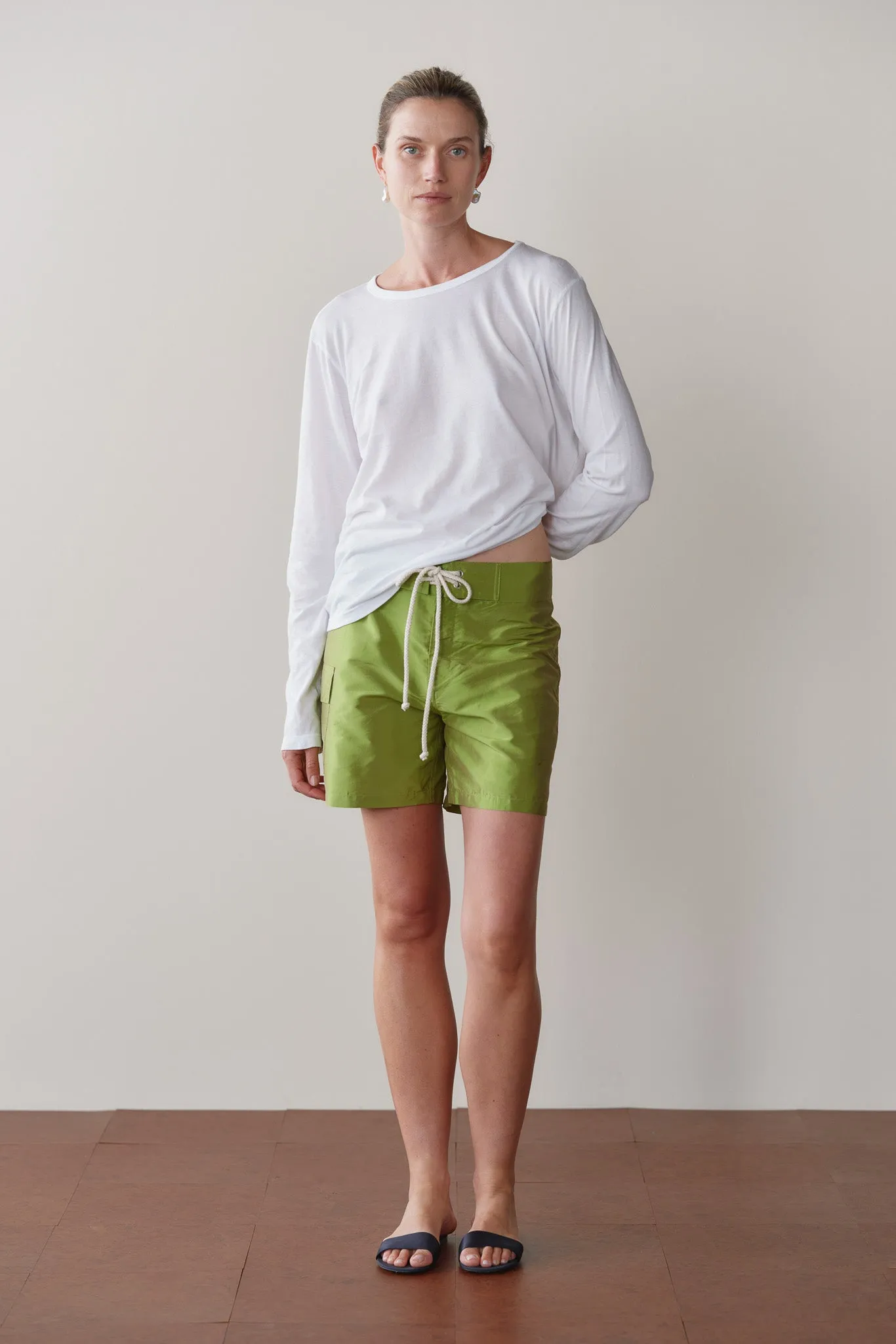 The Silk Taffeta Board Short sold by DONNI.