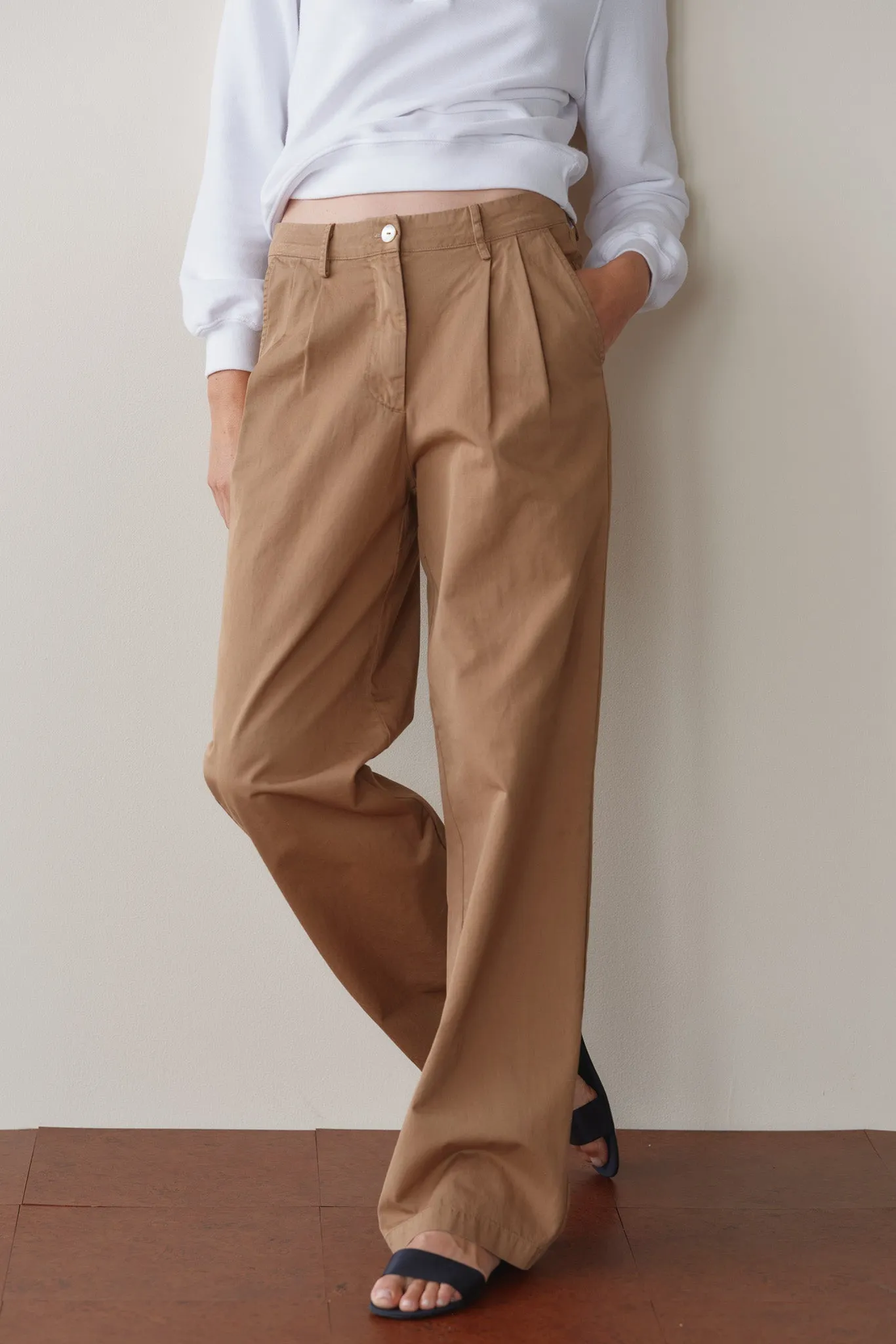 The Chino Pleated Trouser sold by DONNI.