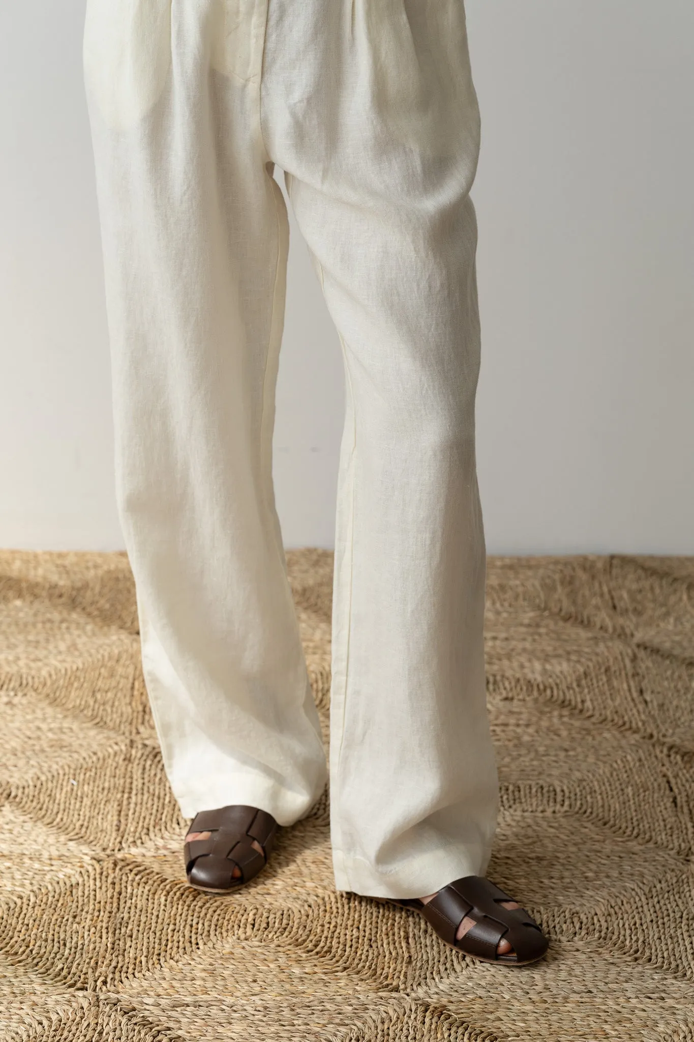 The Linen Pleated Trouser sold by DONNI.