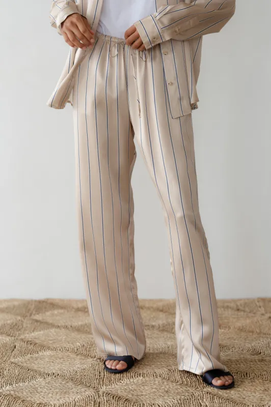 The Silk Pinstripe Drawstring Pant sold by DONNI.