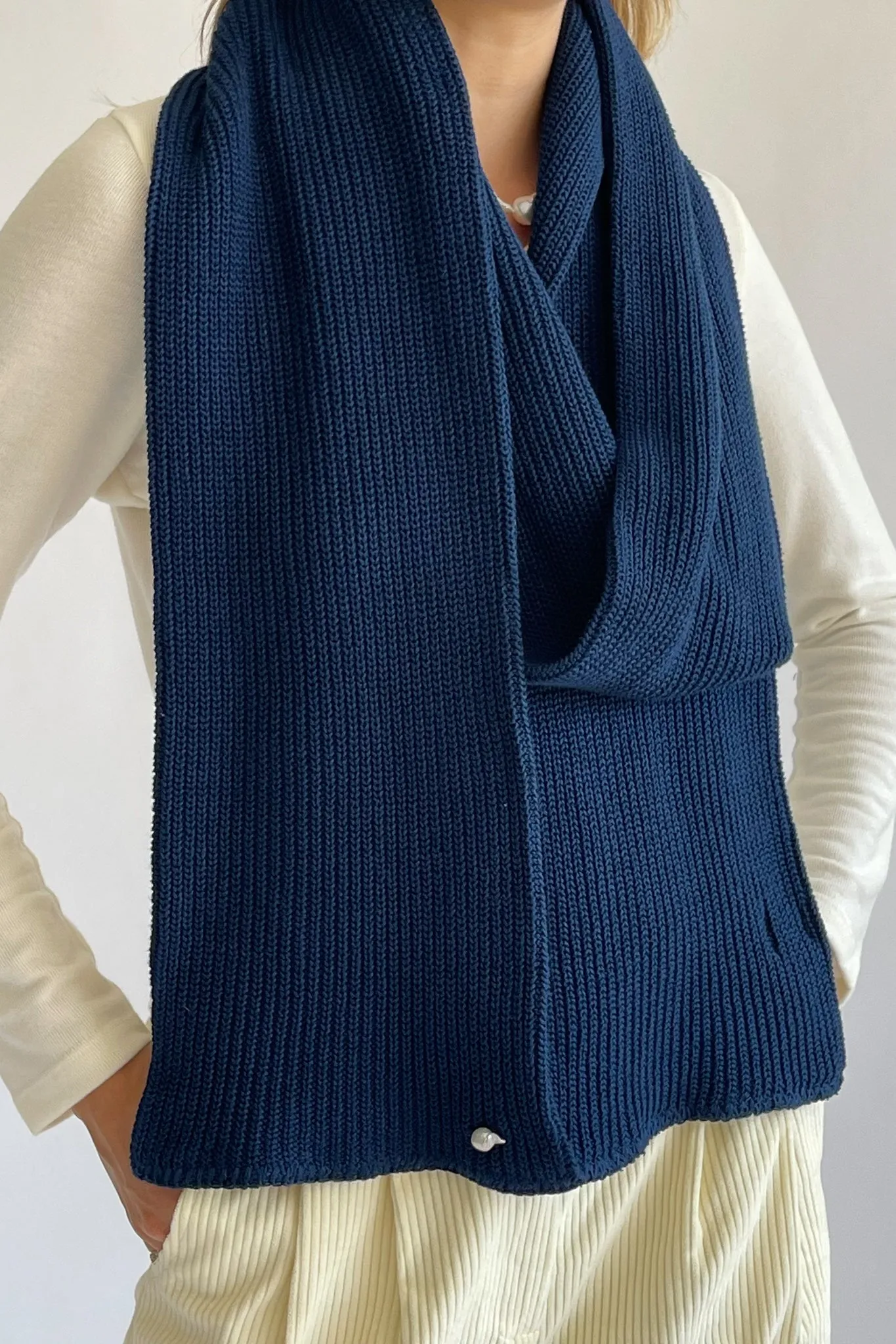 pearl scarf sold by DONNI.