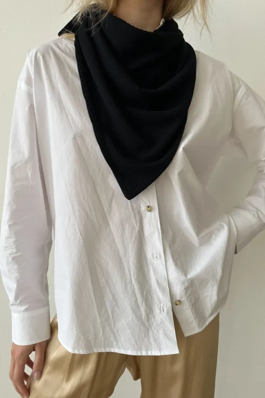 rib knit neck scarf sold by DONNI.