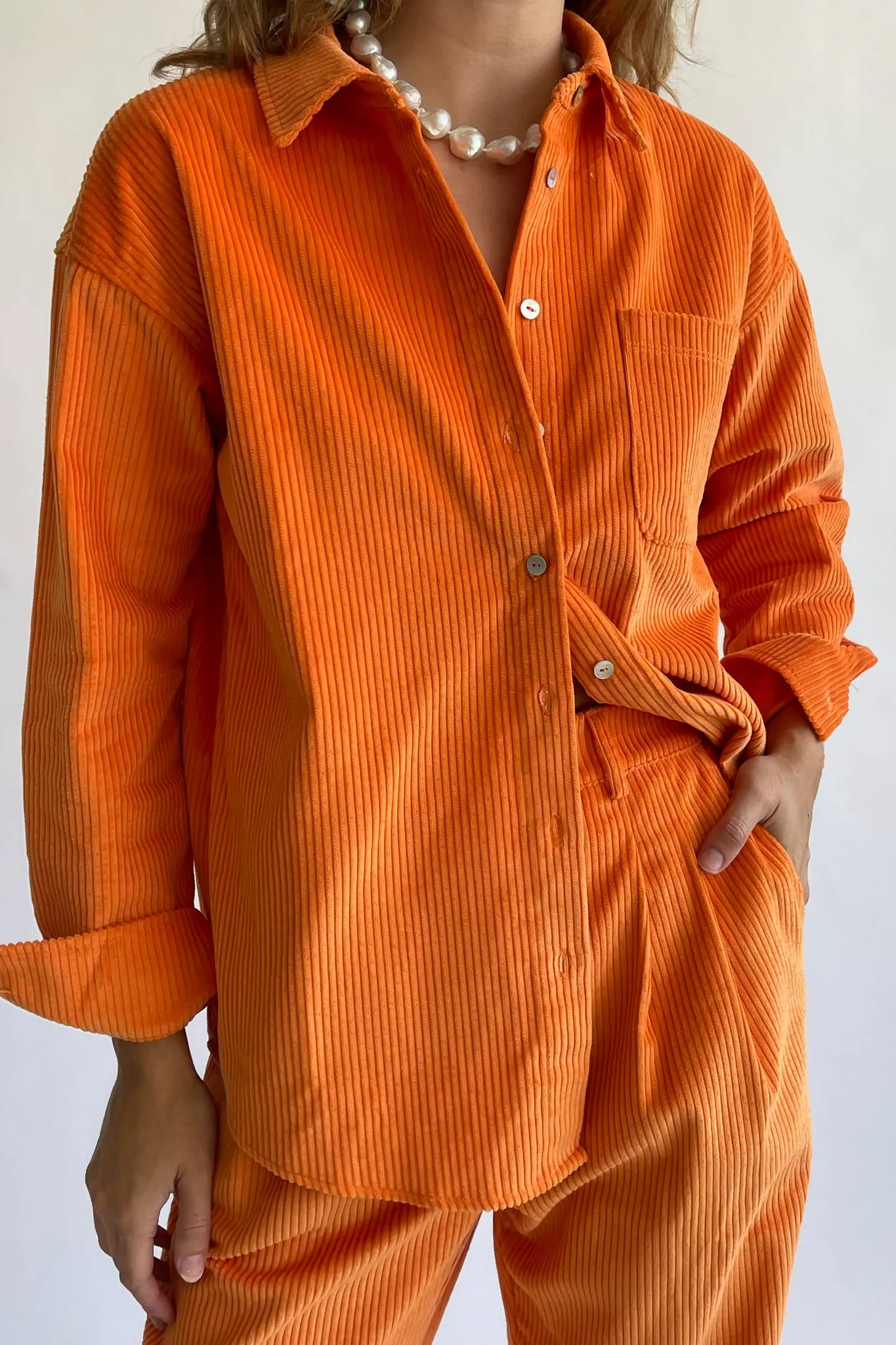 cord button down sold by DONNI.