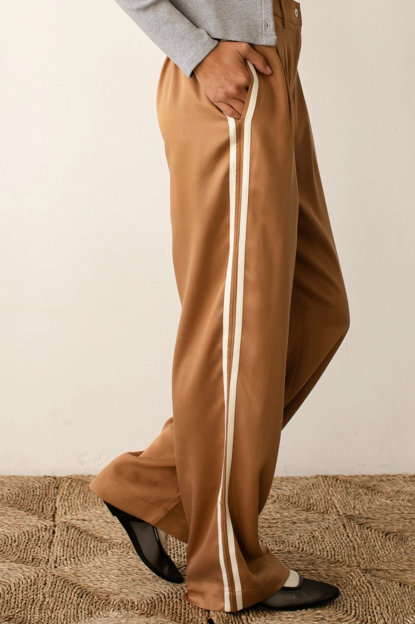 The Twill Pleated Stripe Pant sold by DONNI.