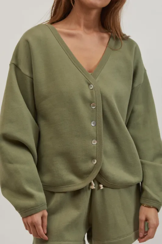 eco-fleece cardi sold by DONNI.