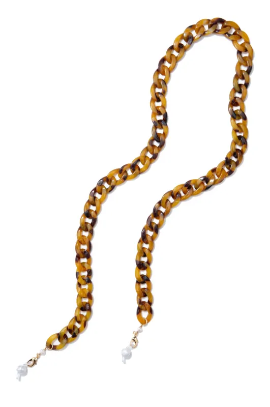 acetate mask/sunny chain sold by DONNI.