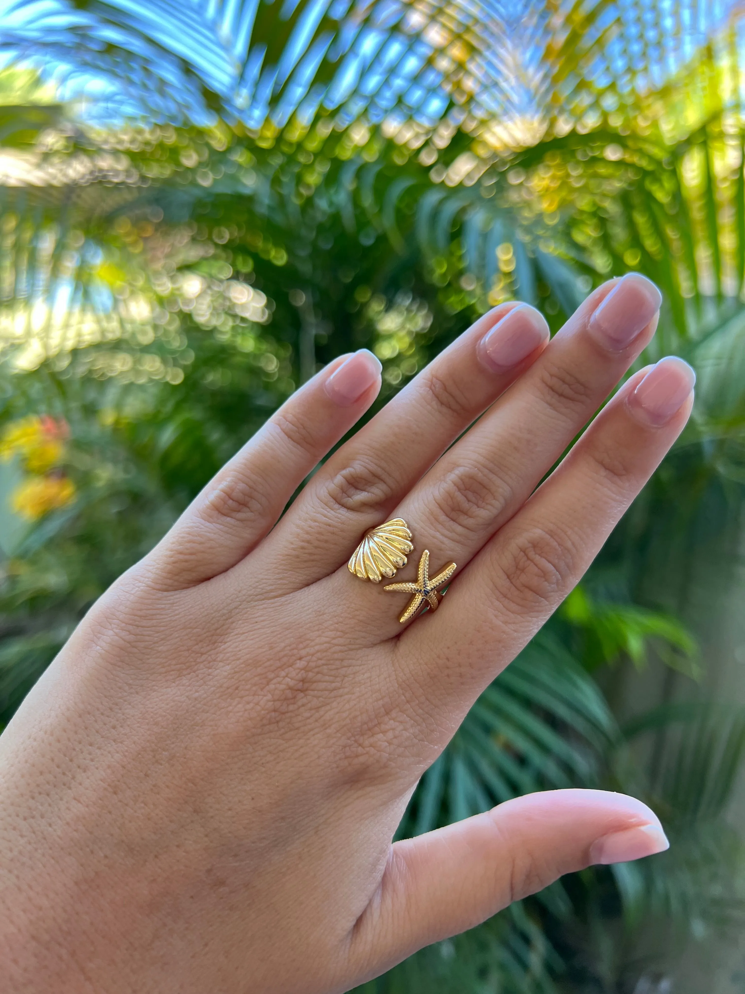 Gold Seashell and Starfish Ring sold by Mermaid & Me