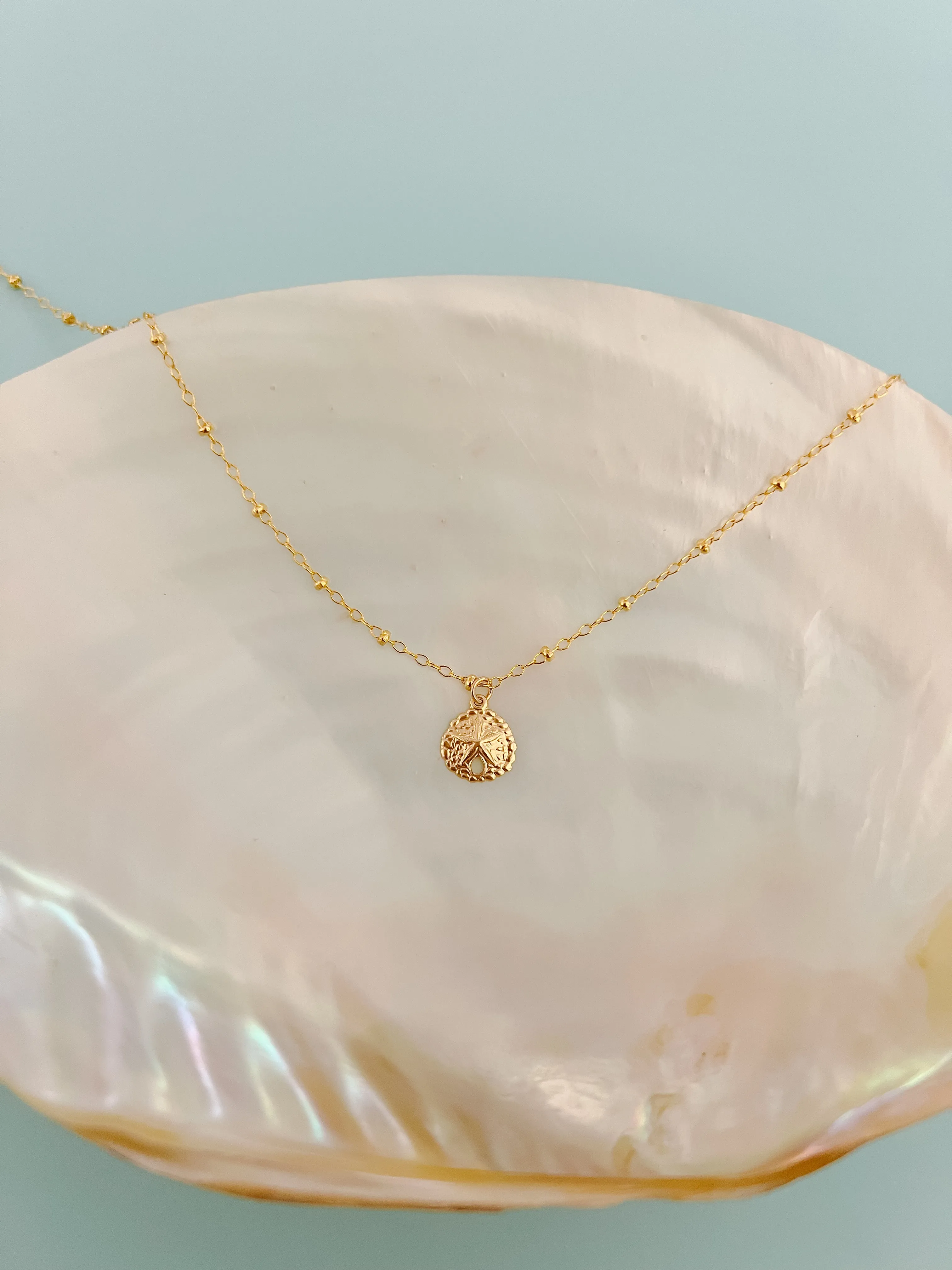 Gold Filled Sand Dollar Necklace sold by Mermaid & Me