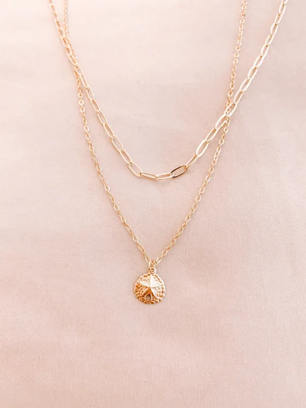 Gold Sand Dollar Necklace sold by Mermaid & Me