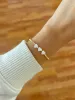3 Horizontal Heart Shell Gold Filled Bracelet sold by Mermaid & Me