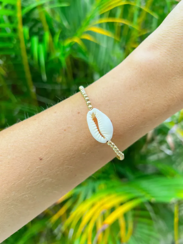 Gold Filled Cowrie Shell Bracelet sold by Mermaid & Me