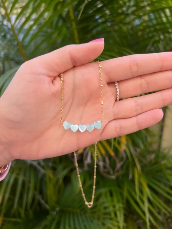 Light Blue Shell Hearts Necklace sold by Mermaid & Me