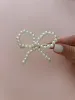Pearl Bow Clip sold by Mermaid & Me