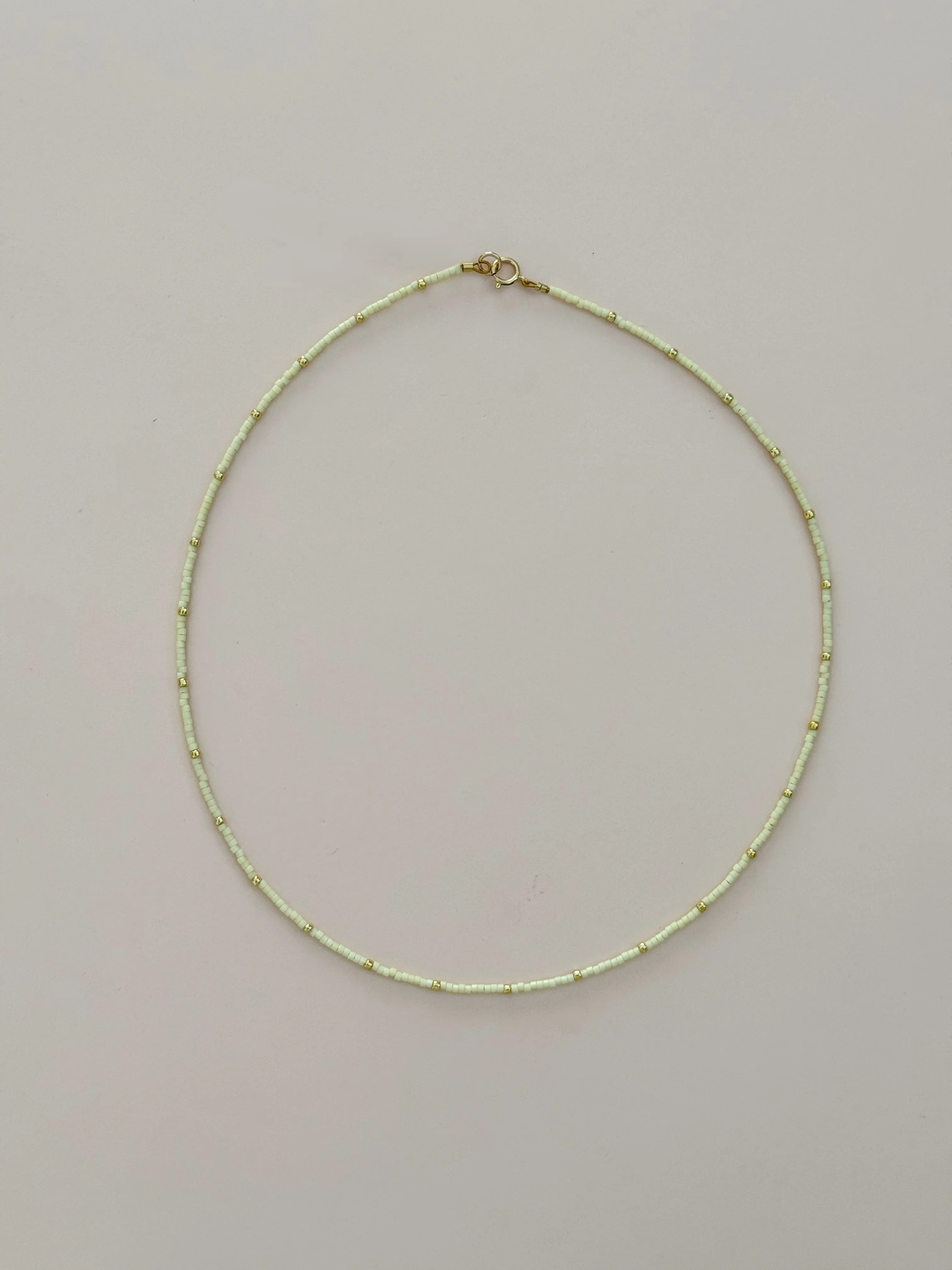 Tiny Pale Yellow Beaded Necklace sold by Mermaid & Me