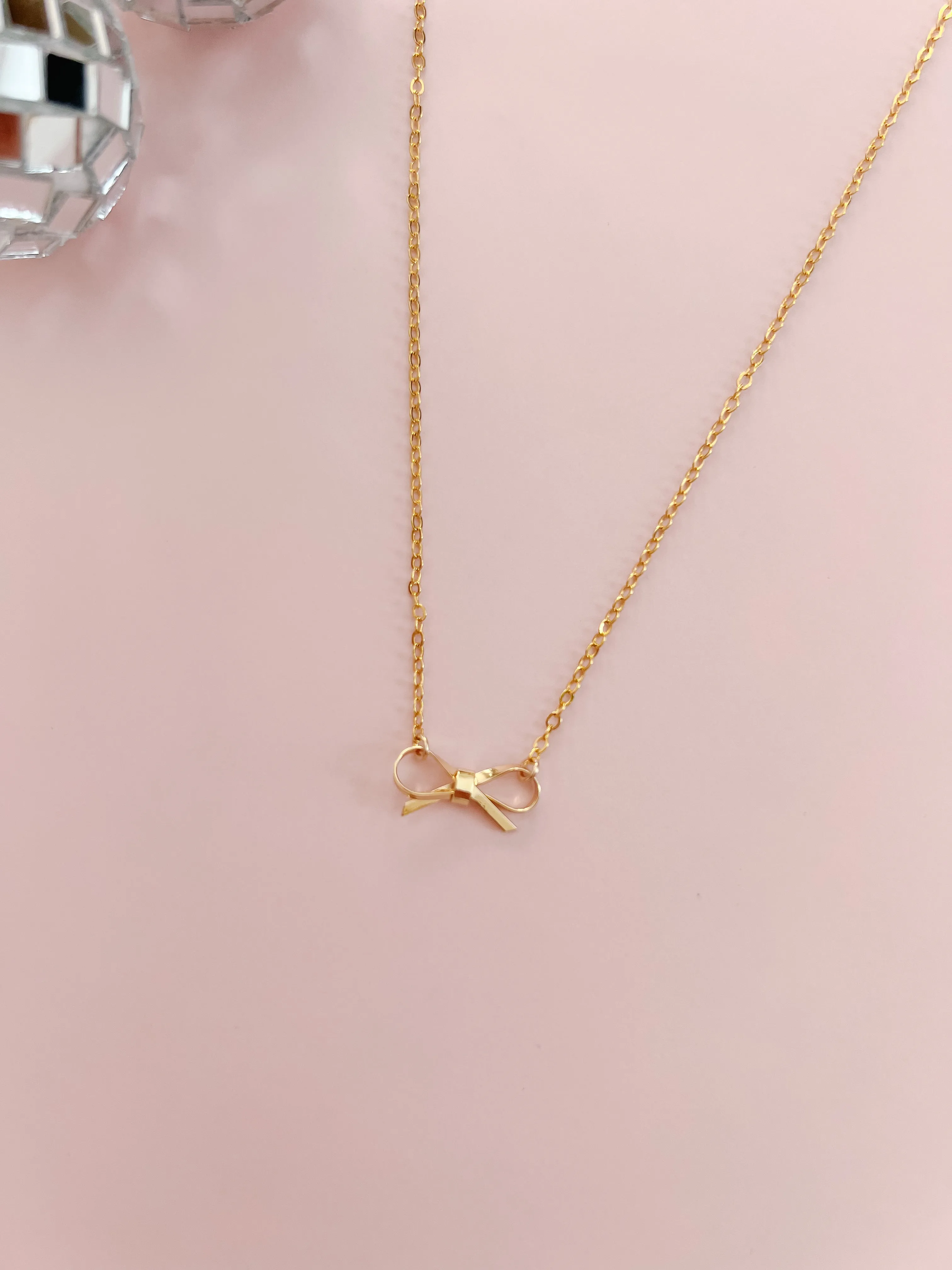 Tiny Bow Necklace sold by Mermaid & Me