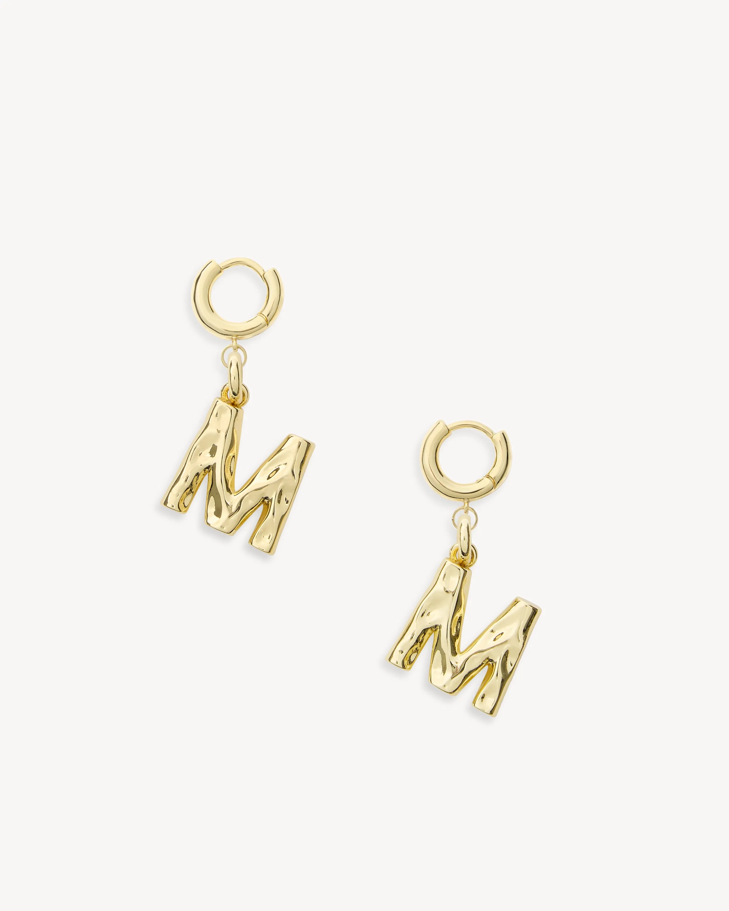 Monogram Huggies in Gold sold by Machete