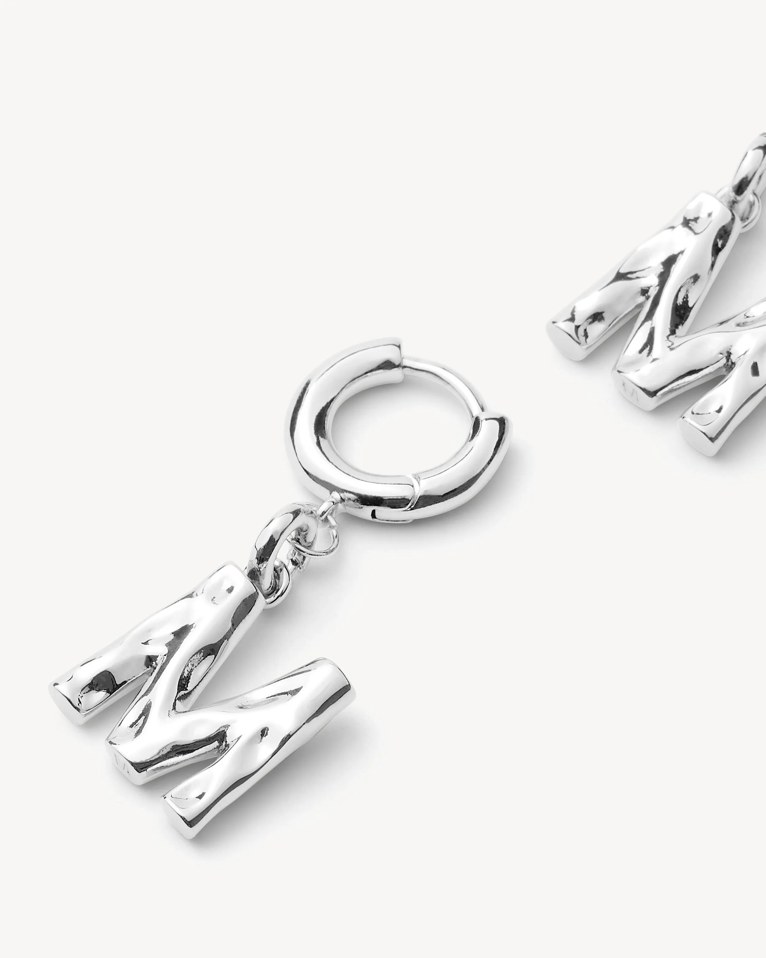 Monogram Huggie in Silver sold by Machete product image thumbnail 3