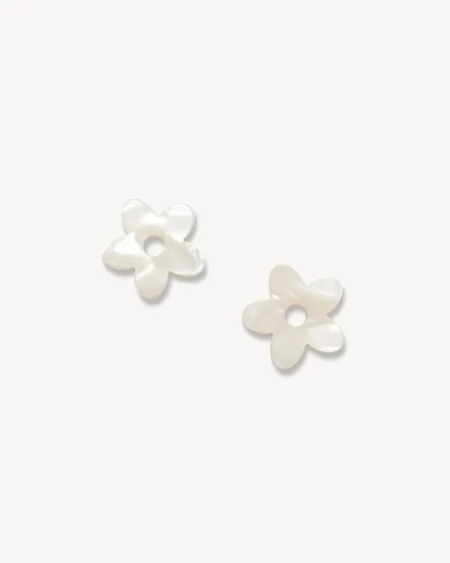 Petite Flower Charms in White Shell sold by Machete