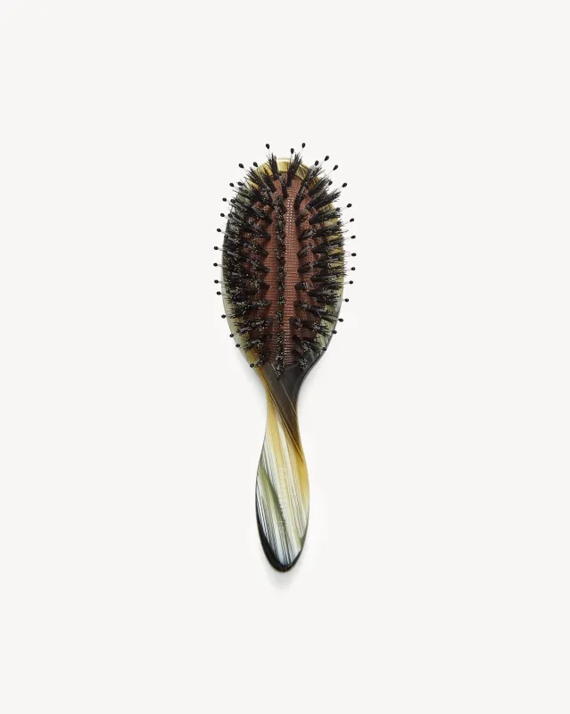 Travel Hair Brush in Horn sold by Machete