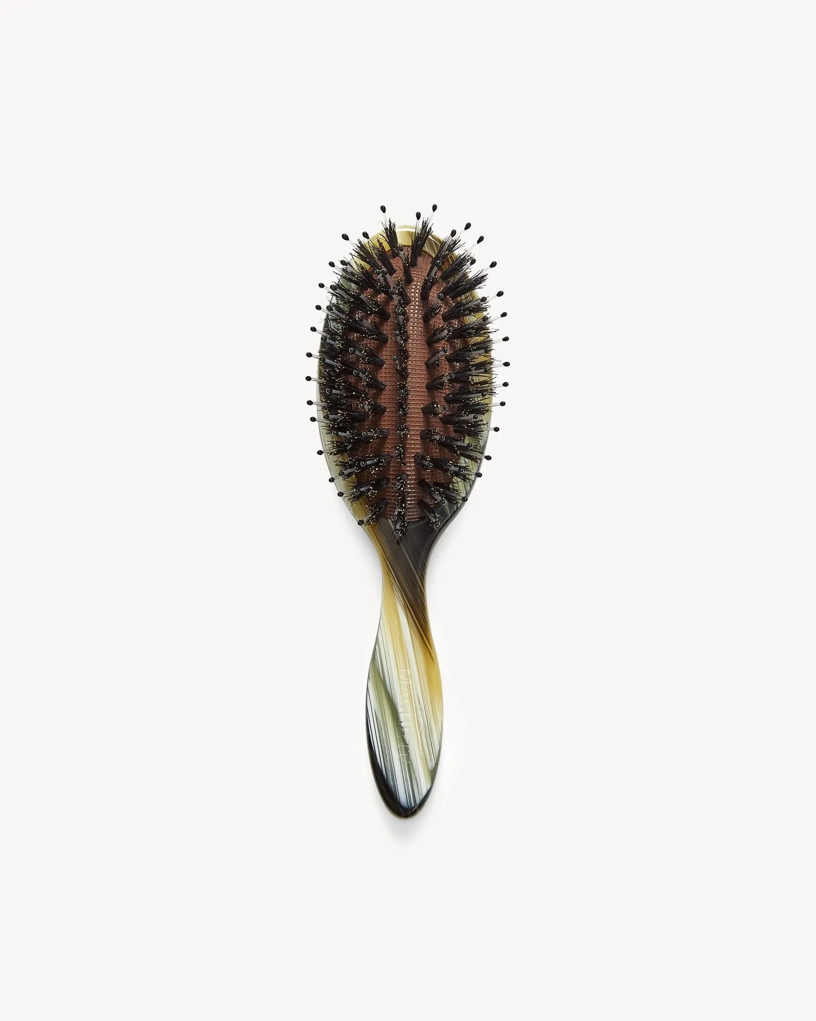 Travel Hair Brush in Horn sold by Machete