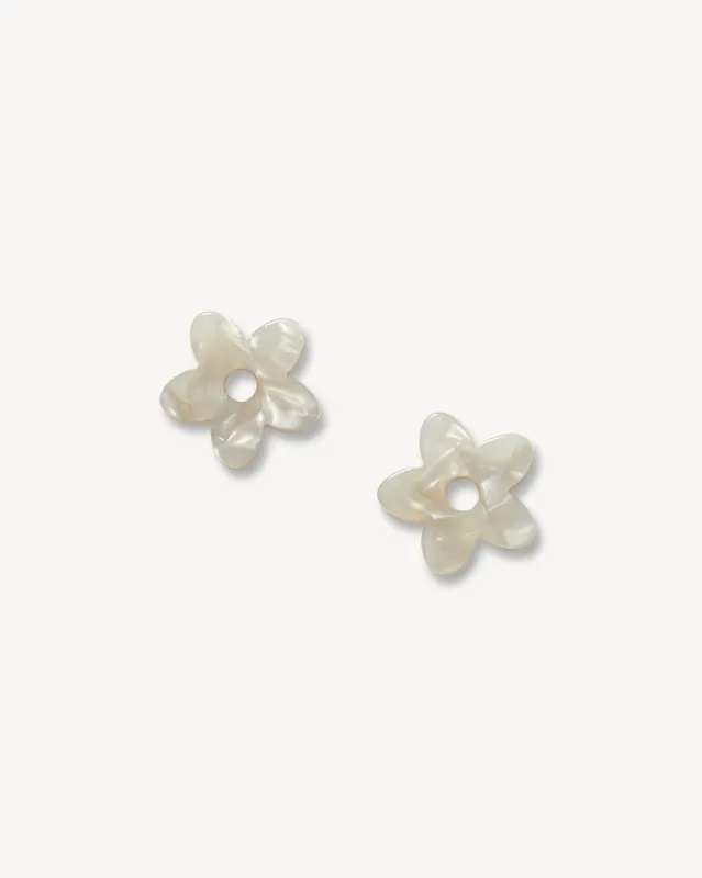 Petite Flower Charms in Grey Shell sold by Machete
