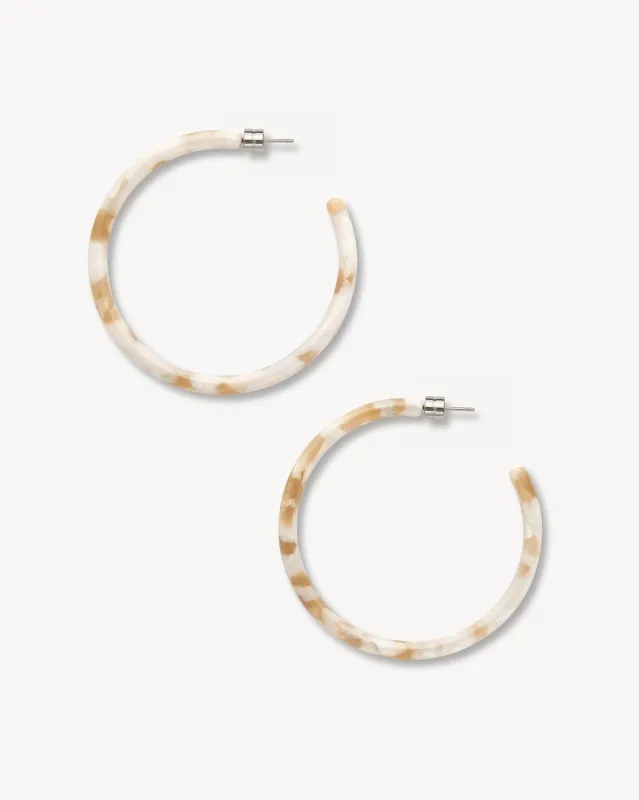 Large Hoops in Taupe Shell sold by Machete