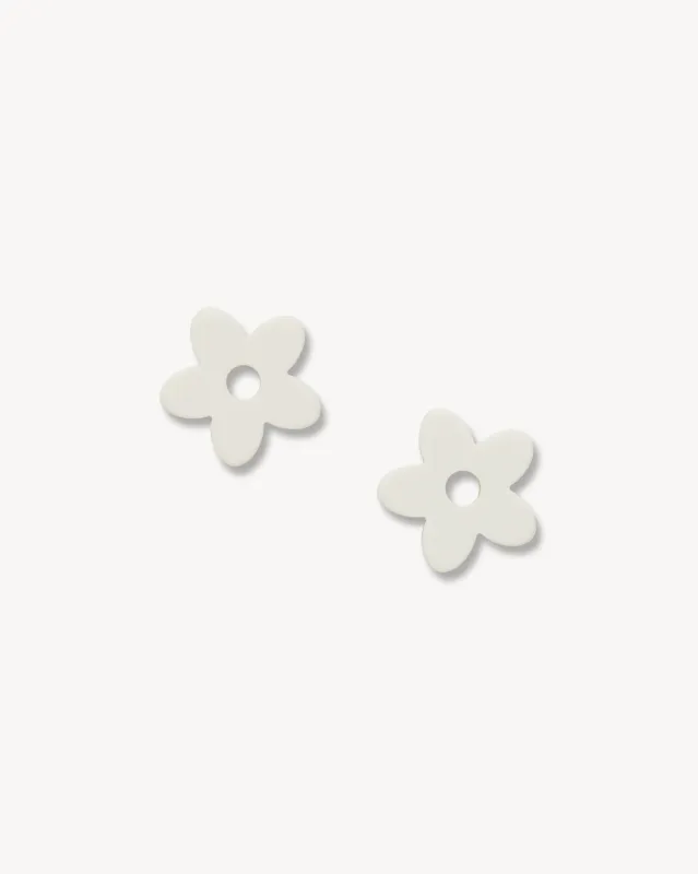 Petite Flower Charms in White Matte sold by Machete