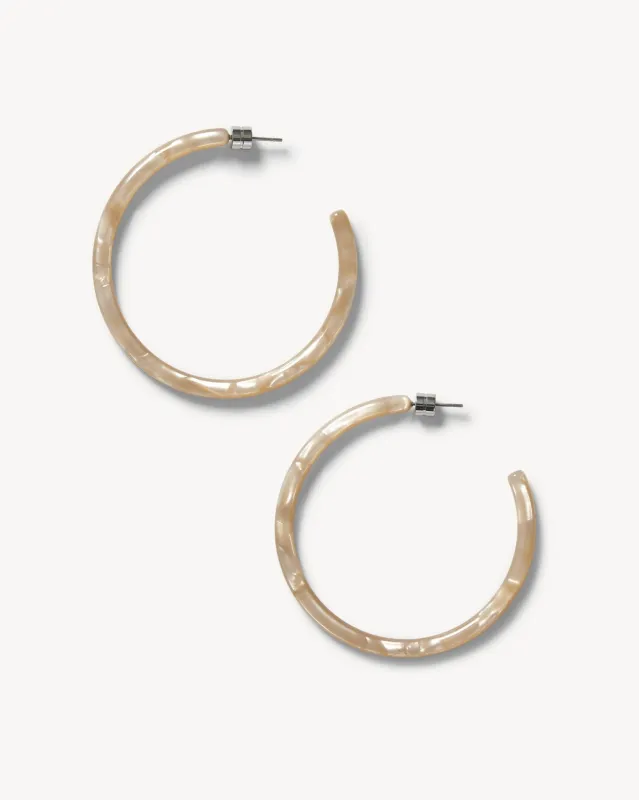 Large Hoops in Sand Shell sold by Machete