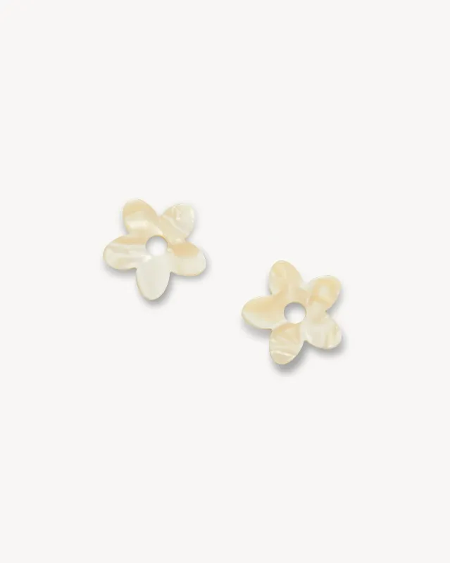 Petite Flower Charms in Ivory sold by Machete