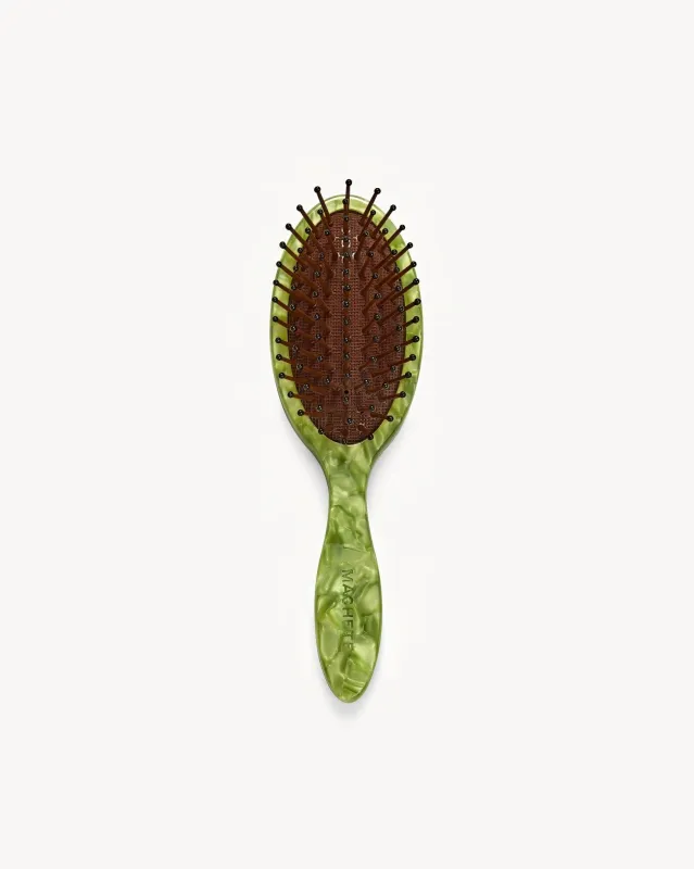 Travel Detangling Hair Brush in Pistachio sold by Machete