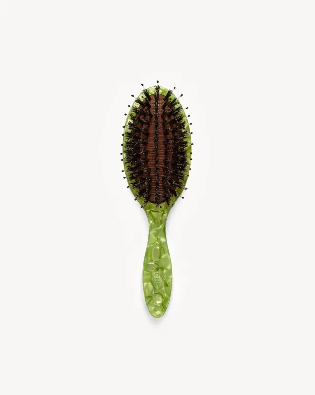 Travel Hair Brush in Pistachio sold by Machete