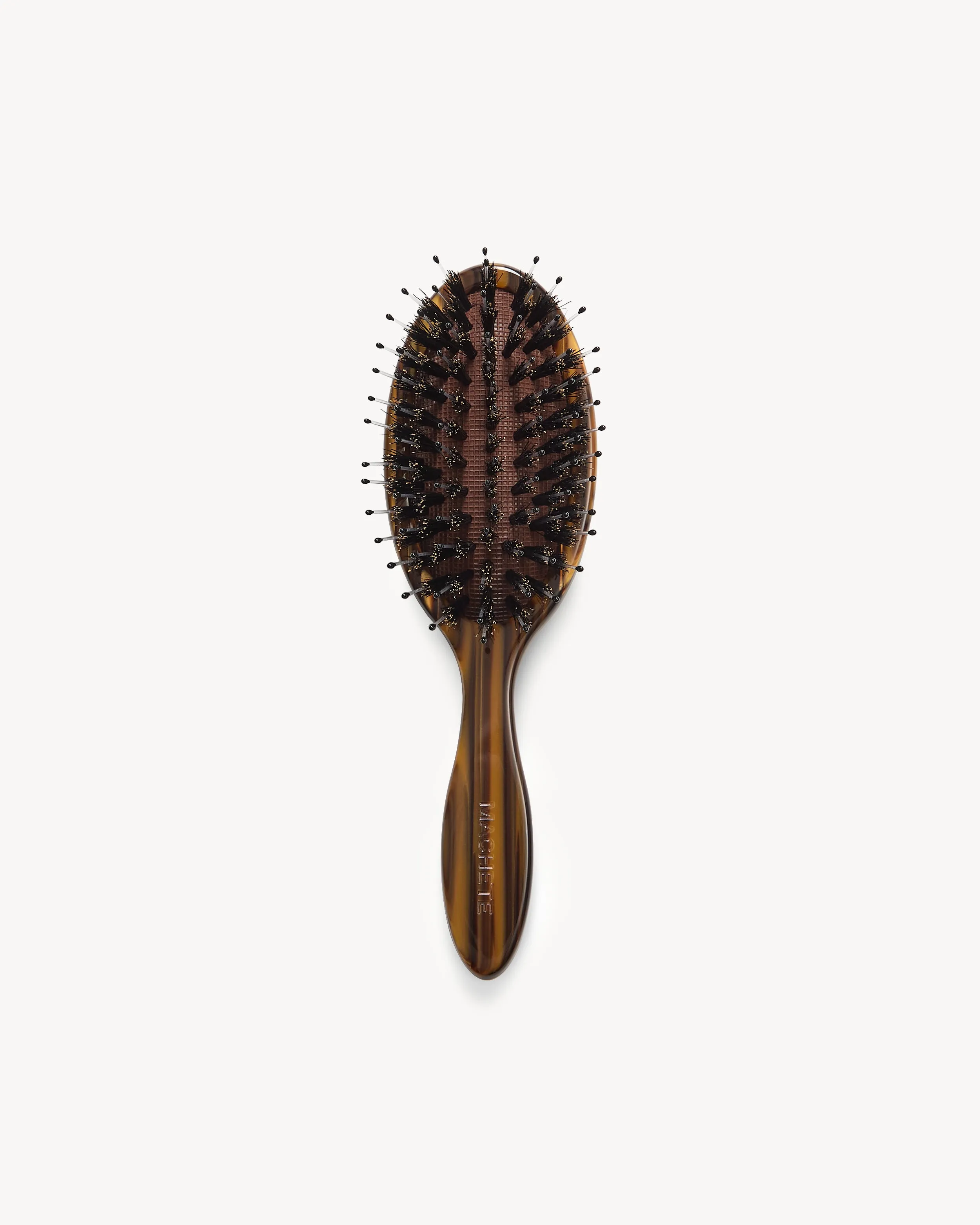 Travel Hair Brush in Tiger's Eye sold by Machete
