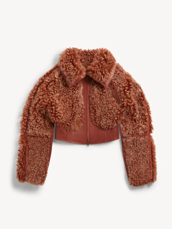 Joan Jacket Rust sold by KNWLS