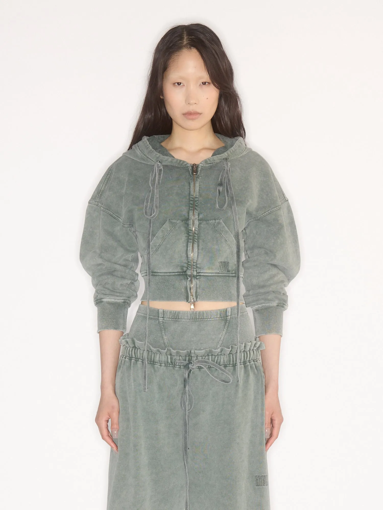 Haze Hoodie Sage sold by KNWLS