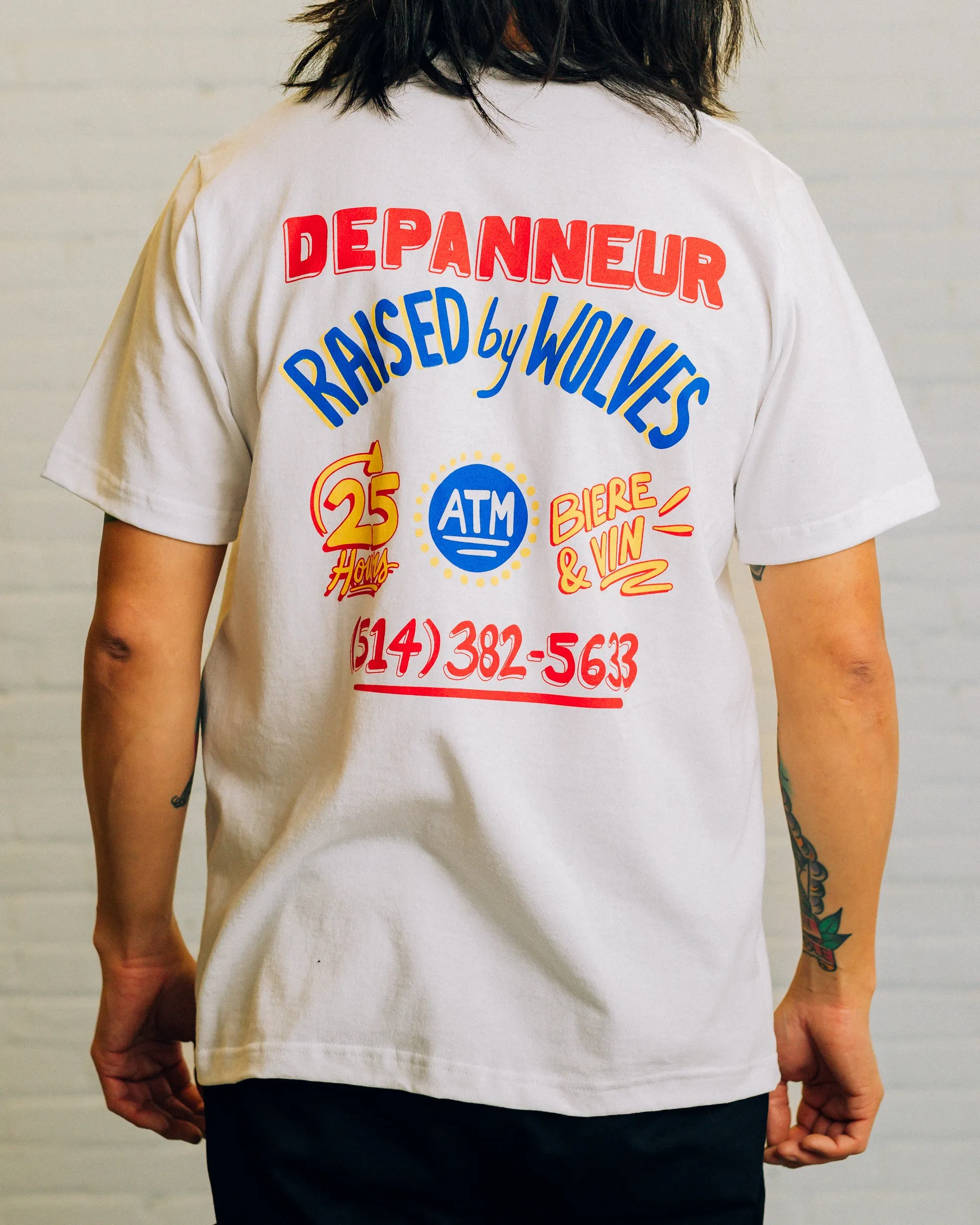 Depanneur Tee sold by Raised by Wolves