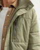 Sherpa-Lined Puffer Coat sold by UpWest
